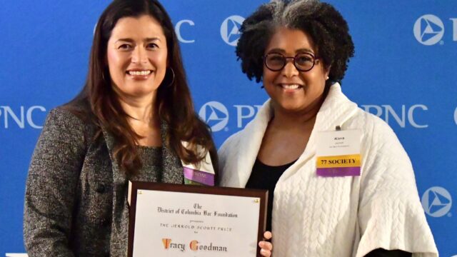 Tracy receives Jerrold Scoutt Prize from Kirra Jarret, DC Bar Foundation