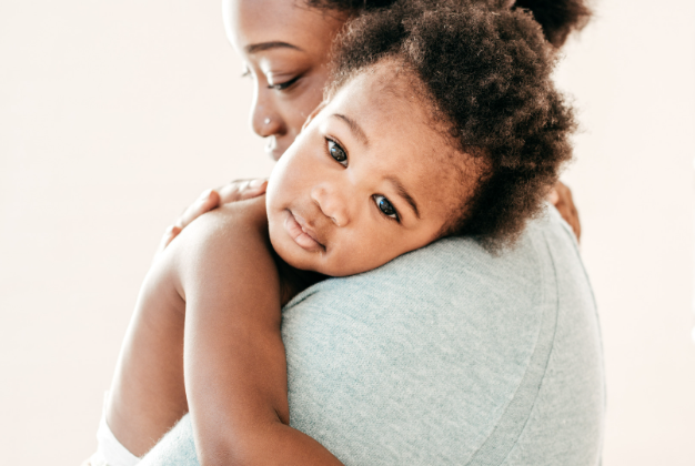 Mom holding baby.