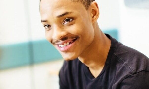 Teen looking ahead and smiling
