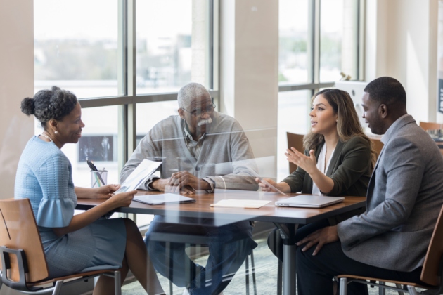 Stock photo of clients and lawyers meeting.